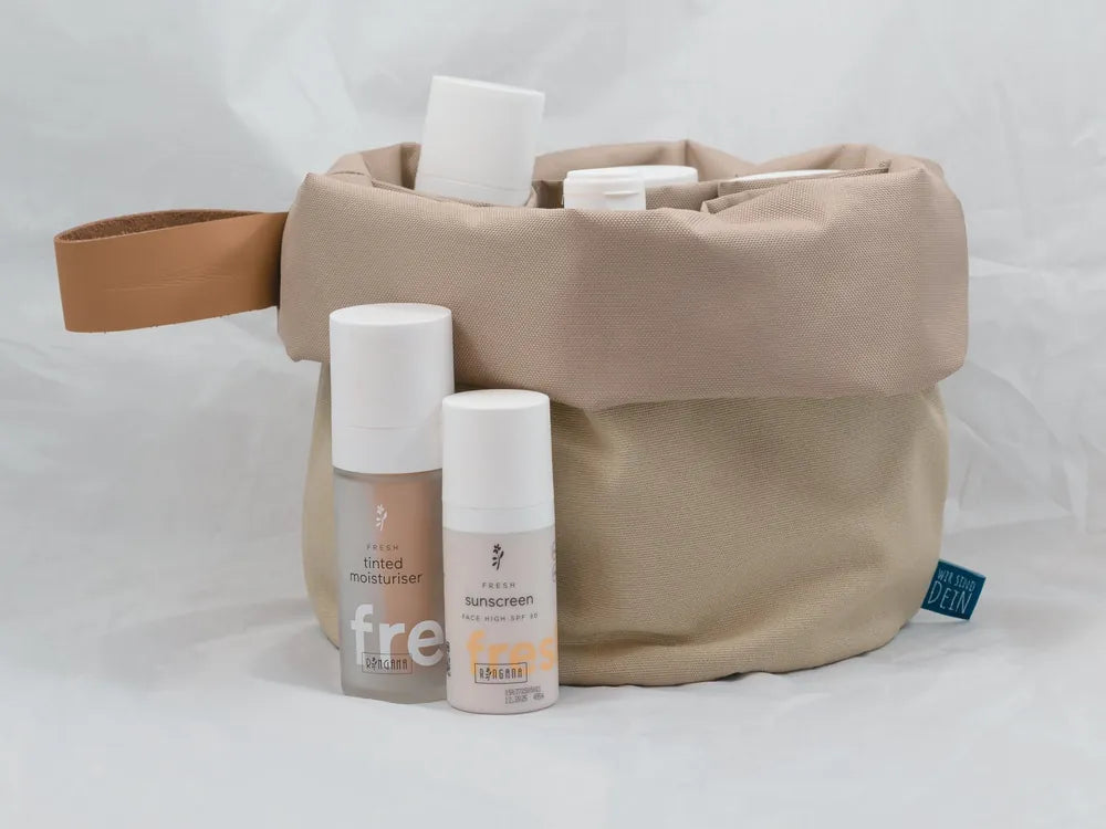 Umgekrempelter Beaubag Sanddüne mit Pflegeprodukten